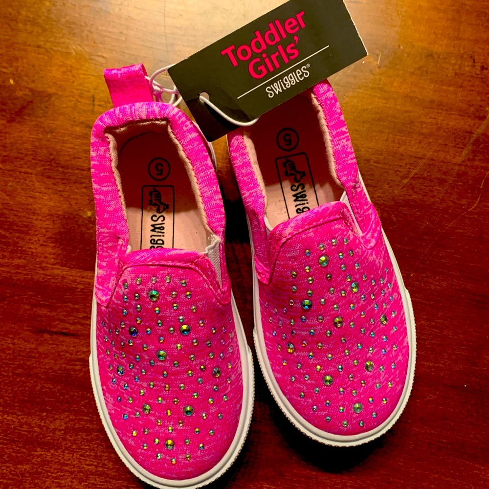 Super cute pink slip ons.